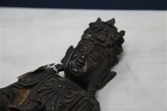 A Chinese late Ming bronze seated figure of a Bodhisattva, and stand, 16th / 17th century, 31.5cm.